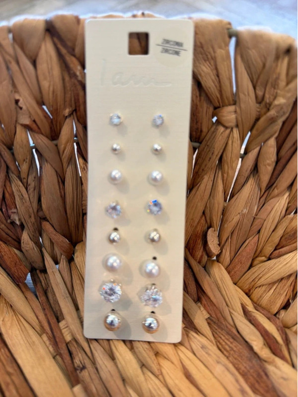 Set of eight, I am earrings.